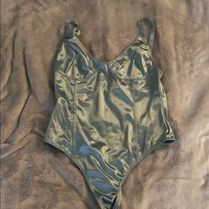 Metallic blue body suit